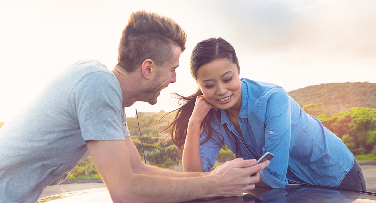 A Couple Looking at a Phone